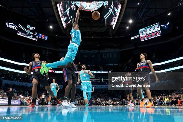 Brandon Miller of the Charlotte Hornets dunks the ball during the second half of a basketball game against the Detroit Pistons at Spectrum Center on...