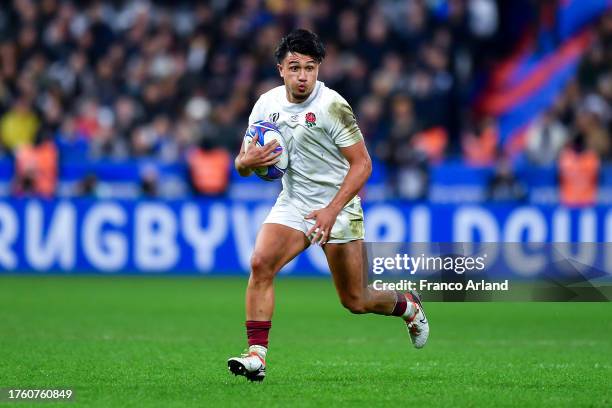 Marcus Smith of England runs with the ball during the Rugby World Cup France 2023 Bronze Final match between Argentina and England at Stade de France...