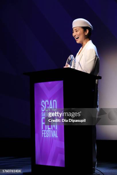 Greta Lee speaks onstage at the Spotlight Award Presentation during the 26th SCAD Savannah Film Festival at Lucas Theatre for the Arts on October 27,...