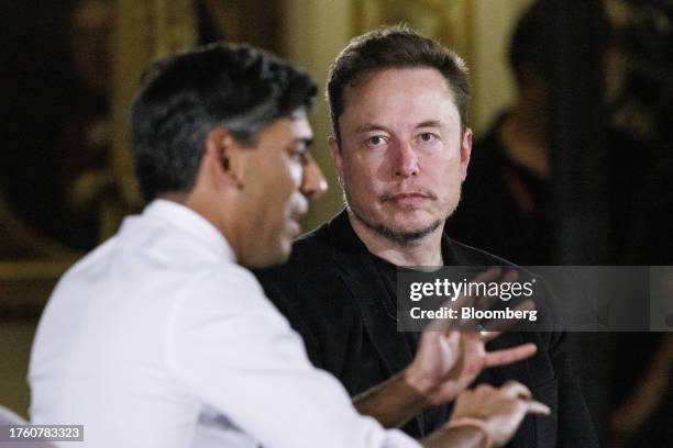 Elon Musk, chief executive officer of Tesla Inc., right, and Rishi Sunak, UK prime minister, during a fireside discussion on artificial intelligence...