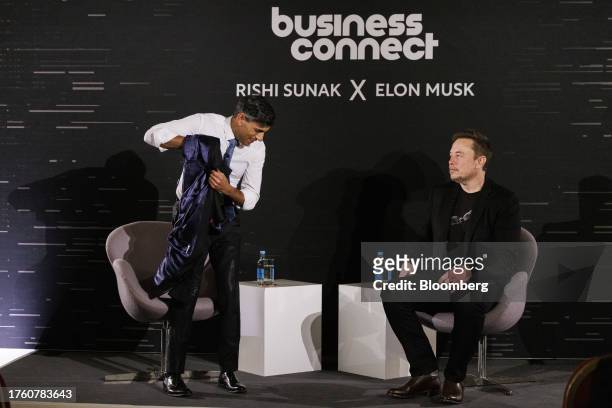 Elon Musk, chief executive officer of Tesla Inc., right, and Rishi Sunak, UK prime minister, during a fireside discussion on artificial intelligence...