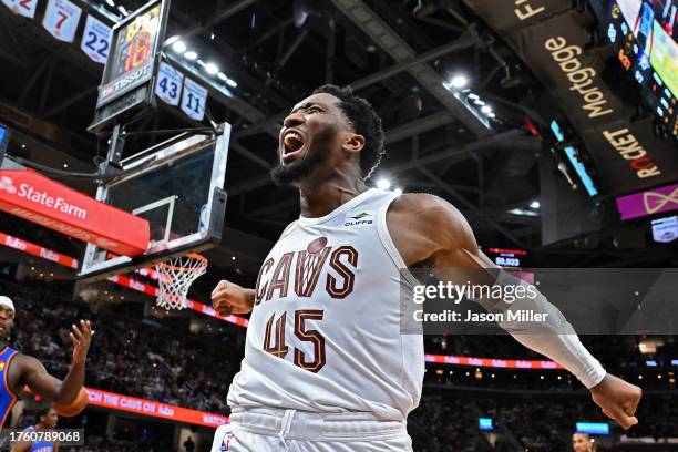 Donovan Mitchell of the Cleveland Cavaliers celebrates after scoring during the fourth quarter against the Oklahoma City Thunder at Rocket Mortgage...