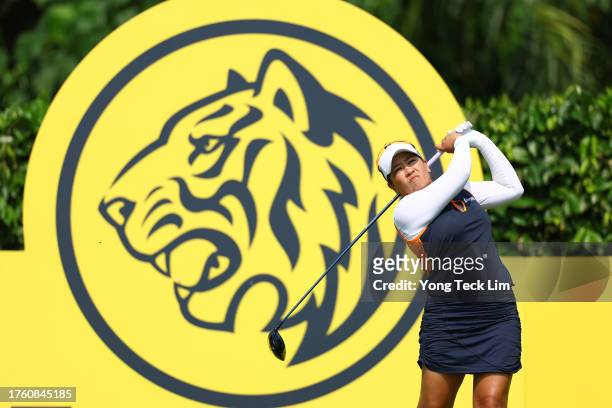 Jasmine Suwannapura of Thailand tees off on the 5th hole during the third round of the Maybank Championship at Kuala Lumpur Golf and Country Club on...