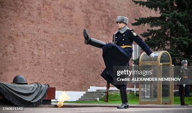 Russian honour guard marches at the Tomb of the Unknown Soldier in Moscow on November 3, 2023.