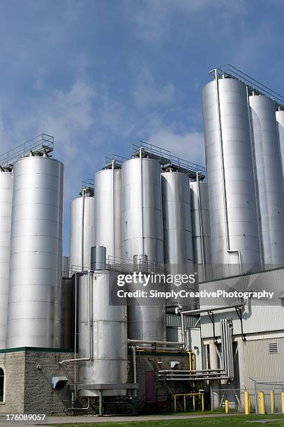 metal storage tanks at a brewery - dairy factory stock pictures, royalty-free photos & images