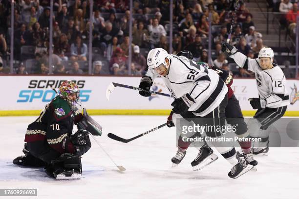 Quinton Byfield of the Los Angeles Kings reacts after scoring a goal past goaltender Karel Vejmelka of the Arizona Coyotes during the third period of...