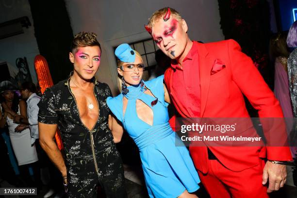 Evangelo Bousis, Paris Hilton and Peter Dundas attend the Annual Casamigos Halloween Party on October 27, 2023 in Los Angeles, California.