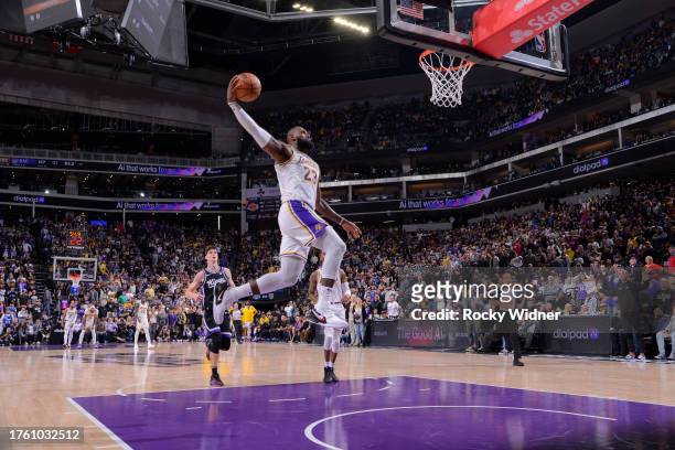LeBron James of the Los Angeles Lakers goes up for the dunk during the game against the Sacramento Kings on October 29, 2023 at Golden 1 Center in...