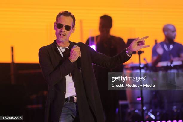 Singer Marc Anthony performs during a concert as part of the 'Viviendo Tour' at Estadio Beto Avila on October 27, 2023 in Cancun, Mexico.