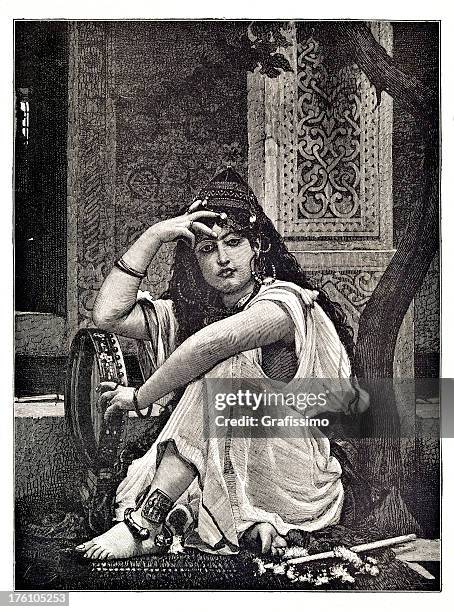 engraving of arabien belly dancer - belly dancer stock illustrations