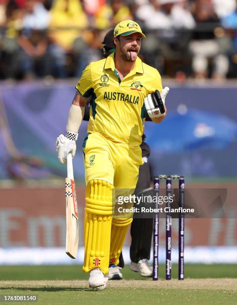 Travis Head of Australia celebrates after reaching his century after scoring 100 runs during the ICC Men's Cricket World Cup India 2023 Group Stage...