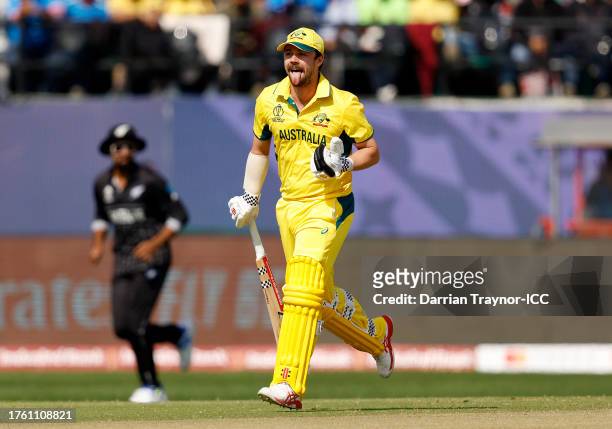 Travis Head of Australia celebrates after reaching his century after scoring 100 runs during the ICC Men's Cricket World Cup India 2023 Group Stage...
