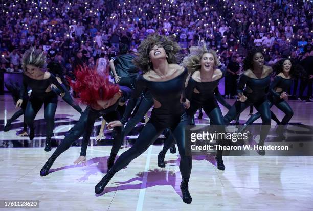 The Sacramento Kings dance team performs prior to the start of the game against Golden State Warriors at Golden 1 Center on October 27, 2023 in...