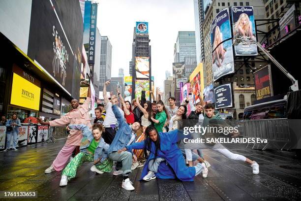 The dancers of the musical "Notre-Dame de Paris" are photographed for Paris Match at Times Square on June 23, 2023 in New York, United States of...