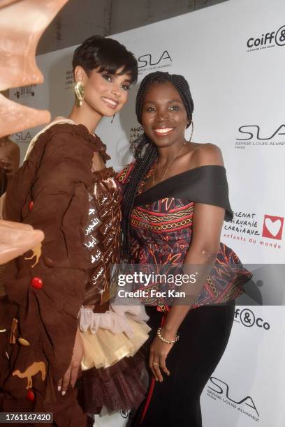 Eve Gilles and a guest attend "Salon Du Chocolat 2023 - Chocolate Fair" 28th Edition to benefit to Mécénat Chirurgie Cardiaque at Parc des...