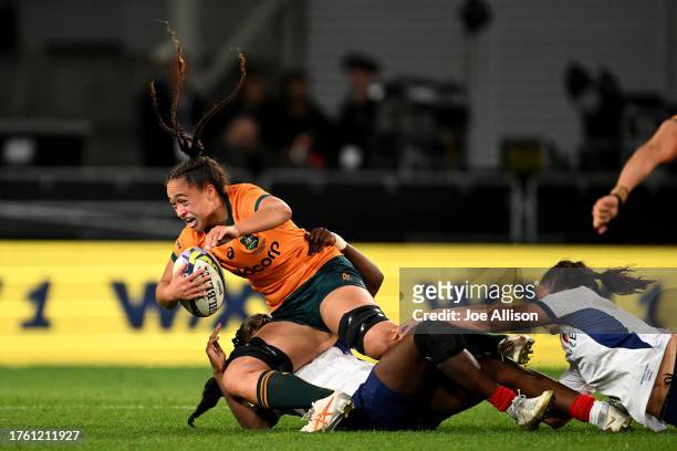 Leilani Nathan of Australia is tackled during the WXV1 match between France and Australia Wallaroos at Forsyth Barr Stadium on October 28, 2023 in...