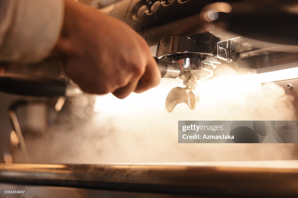 Close Up Of Coffee Preparation On An Espresso Machine