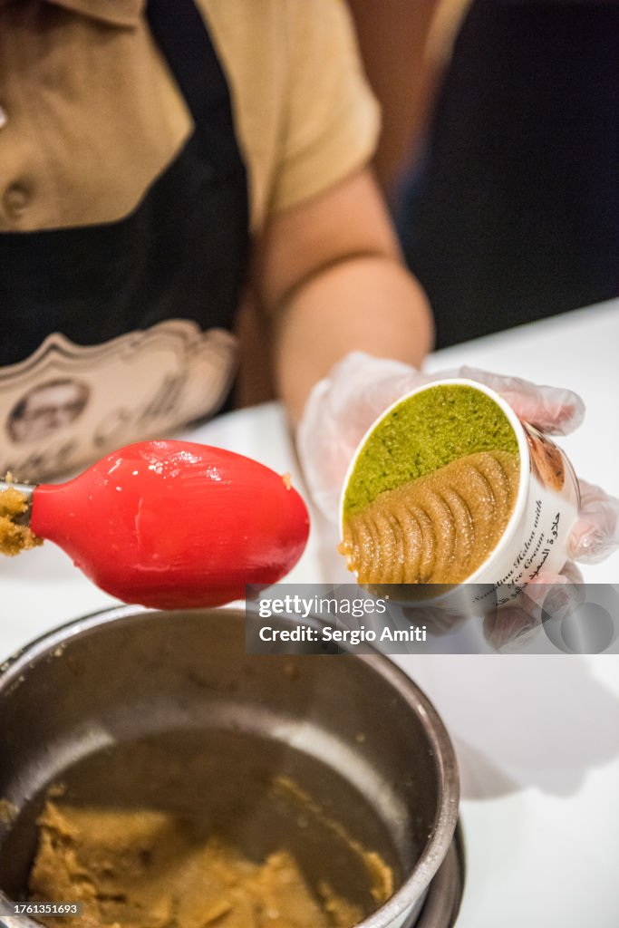 Serving semolina halva with ice cream cup