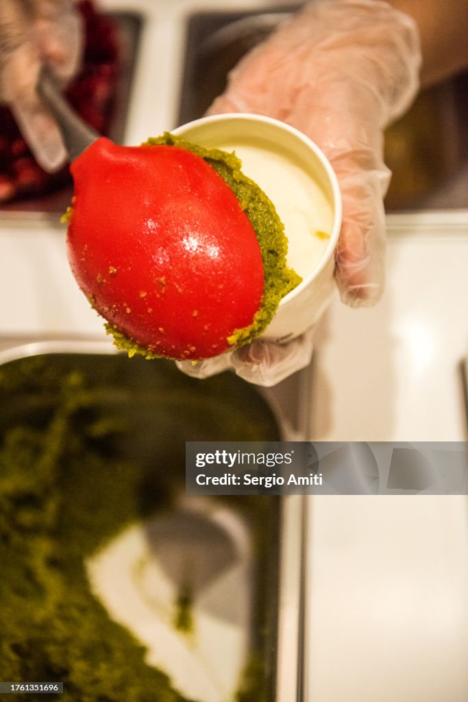 Serving semolina halva with ice cream cup