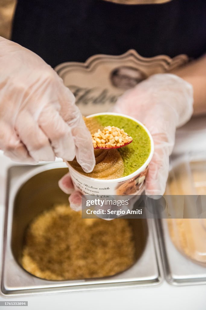Serving semolina halva with ice cream cup