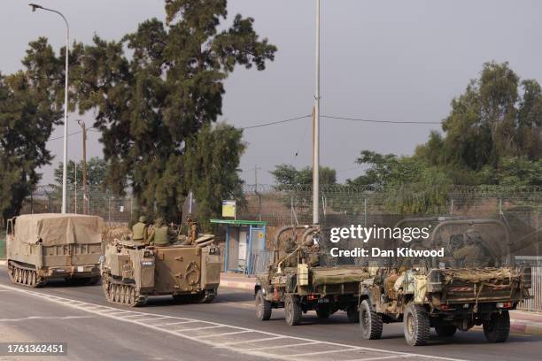 Israeli tanks and troops move near the border with Gaza on October 28, 2023 in Sderot, Israel. In the wake of the Oct. 7 attacks by Hamas that left...