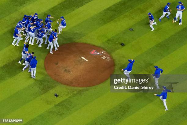 Members of the Texas Rangers celebrate after winning against the Arizona Diamondbacks in Game 5 of the 2023 World Series at Chase Field on Wednesday,...