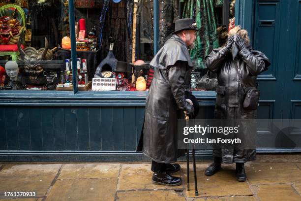 Visitors wearing costumes attend Whitby Goth Weekend on October 28, 2023 in Whitby, England. The Whitby Goth Weekend is an alternative festival which...