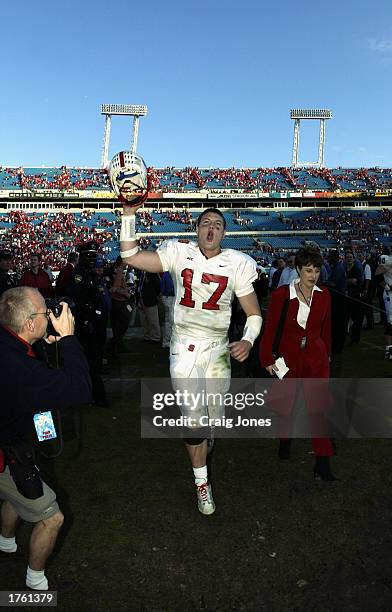 Quarterback Philip Rivers of the North Carolina State University Wolfpack celebrates the victory over the Notre Dame Fighting Irish in the Toyota...