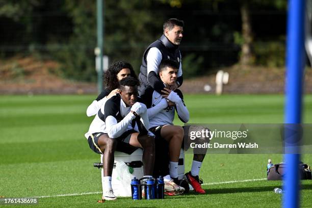 Marc Cucurella, Nicolas Jackson, Enzo Fernandez and Head Coach Mauricio Pochettino of Chelsea during a training session at Chelsea Training Ground on...