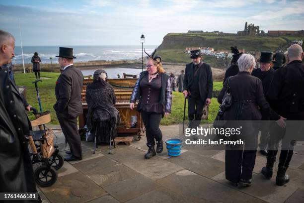 Fans of gothic clothing attend Whitby Goth Weekend on October 28, 2023 in Whitby, England. The Whitby Goth Weekend is an alternative festival which...