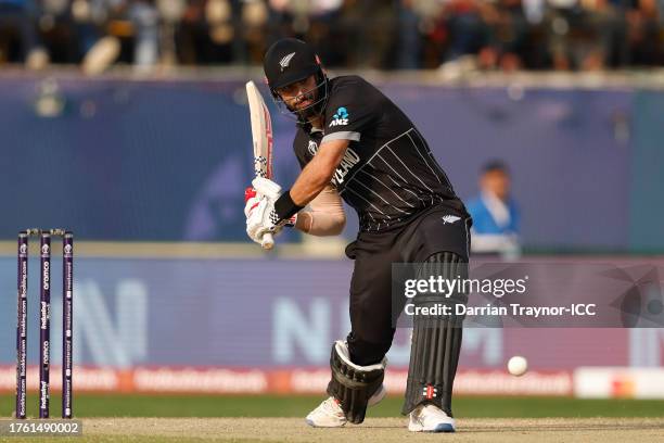 Daryl Mitchell of New Zealand bats during the ICC Men's Cricket World Cup India 2023 between Australia and New Zealand at HPCA Stadium on October 28,...