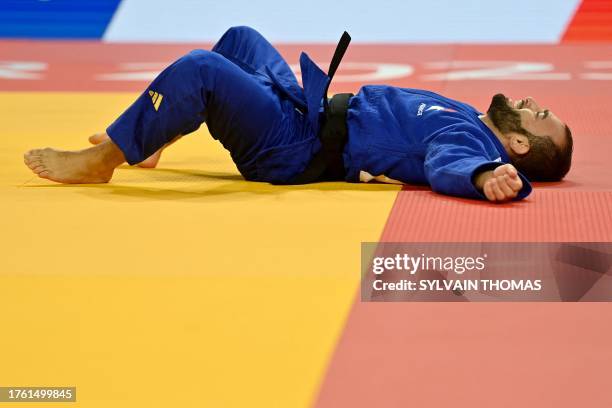 France's Luka Mkheidze reacts after winning against Ukraine's Dilshot Khalmatov in the men's under 60kg final bout during the European Judo...