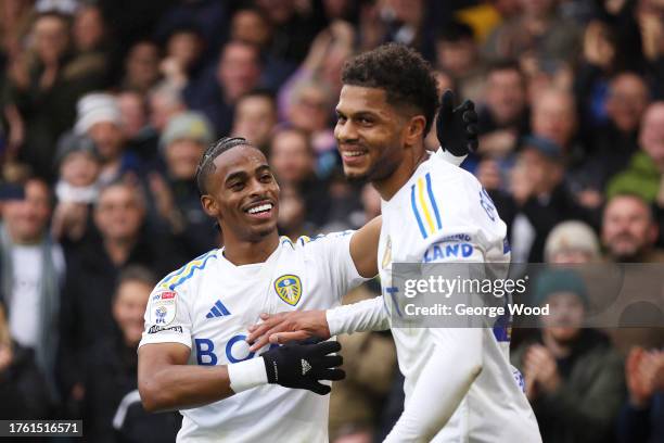 Crysencio Summerville of Leeds United celebrates with teammate Georginio Rutter after scoring the team's fourth goal during the Sky Bet Championship...