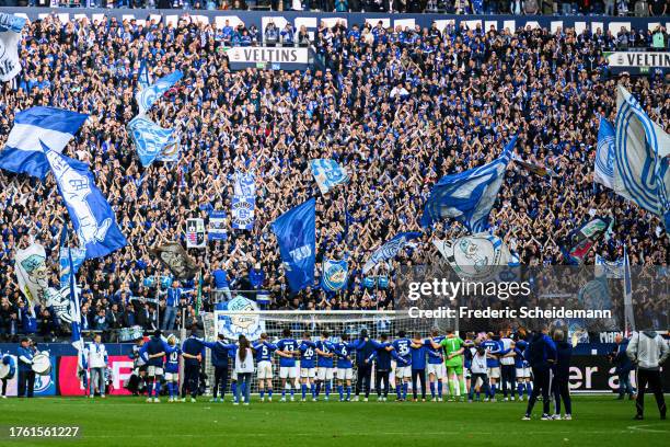 Team of Schalke celebrates the victory after the Second Bundesliga match between FC Schalke 04 and Hannover 96 at Veltins Arena on October 28, 2023...