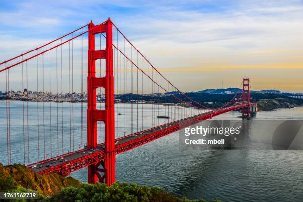golden gate bridge at sunset - san francisco california - san francisco bay stock pictures, royalty-free photos & images