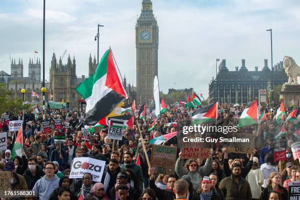 The march passes over Waterloo bridge on October 28, 2023 in London, England. A coalition of organisations, including the Palestine Solidarity...