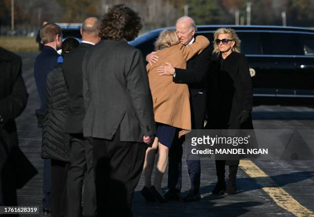President Joe Biden greets his wife Jill Biden upon arrival at Brunswick Executive Airport in Brunswick, Maine, en route to Lewiston, Maine, on...