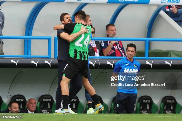 Daniel Boloca of US Sassuolo celebrates after scoring a goal with Alessio Dionisi head coach of US Sassuolo during the Serie A TIM match between US...