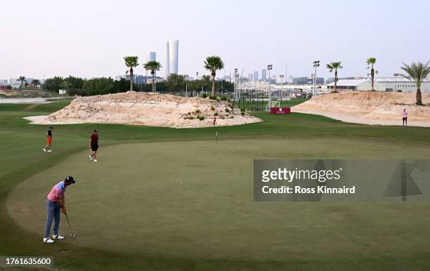 Scott Jamieson of Scotland putting on the 16th green during the third round of the Commercial Bank Qatar Masters at Doha Golf Club on October 28,...