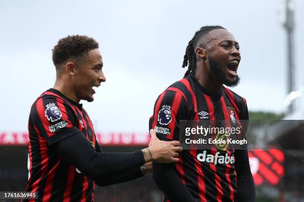 Antoine Semenyo of AFC Bournemouth celebrates alongside teammate Marcus Tavernier after scoring the team's first goal during the Premier League match...