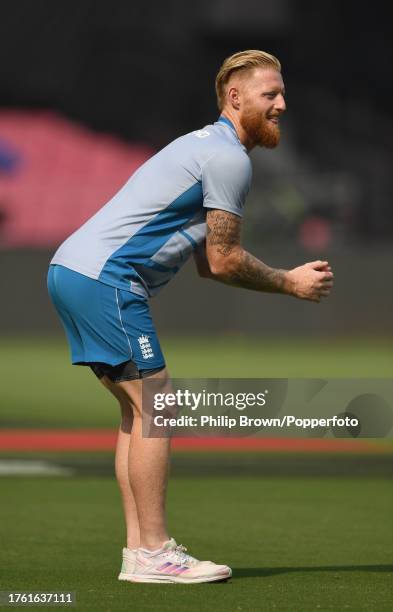 Ben Stokes of England about to kick a rugby ball during the ICC Men's Cricket World Cup India 2023 England training session at Bharat Ratna Shri Atal...