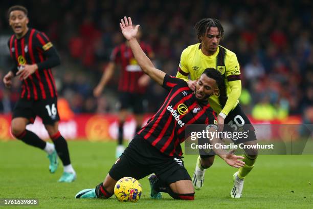 Lloyd Kelly of AFC Bournemouth is challenged by Luca Koleosho of Burnley during the Premier League match between AFC Bournemouth and Burnley FC at...