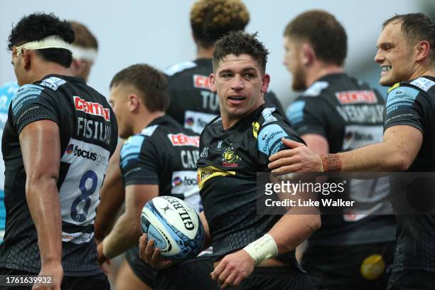Dan Frost of Exeter Chiefs celebrates scoring his teams second try during the Gallagher Premiership Rugby match between Exeter Chiefs and Sale Sharks...