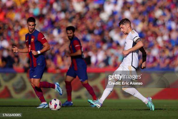 Federico Valverde of Real Madrid passes the ball during the LaLiga EA Sports match between FC Barcelona and Real Madrid CF at Estadi Olimpic Lluis...