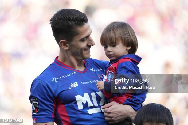 Henrique Trevisan of FC Tokyo and his child look on prior to the J.LEAGUE Meiji Yasuda J1 31st Sec. Match between F.C.Tokyo and Sanfrecce Hiroshima...