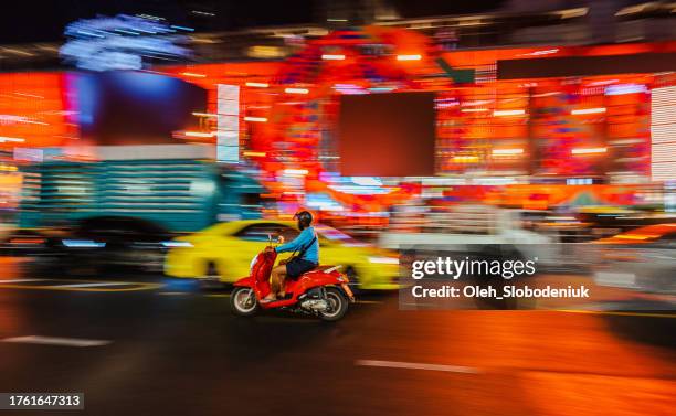 street of  bangkok at night. blurred motion of traffic - south korea v japan stock pictures, royalty-free photos & images