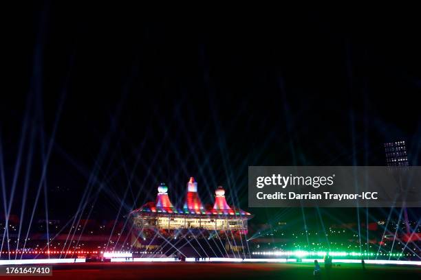 Dramatic light show takes place after the ICC Men's Cricket World Cup India 2023 between Australia and New Zealand at HPCA Stadium on October 28,...