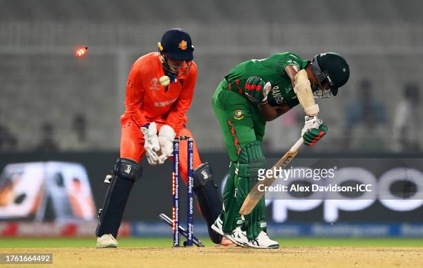 Mustafizur Rahman of Bangladesh is bowled by Colin Ackermann of Netherlands during the ICC Men's Cricket World Cup India 2023 Group Stage Match...