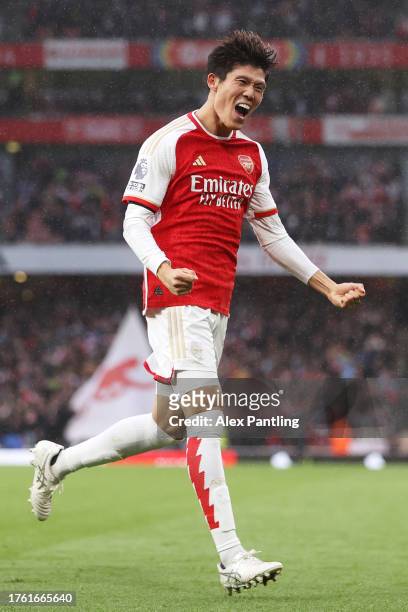 Takehiro Tomiyasu of Arsenal celebrates after scoring the team's fifth goal during the Premier League match between Arsenal FC and Sheffield United...