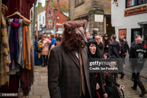 Man dressed as a werewolf walks through town as he attends Whitby Goth Weekend on October 28, 2023 in Whitby, England. The Whitby Goth Weekend is an...